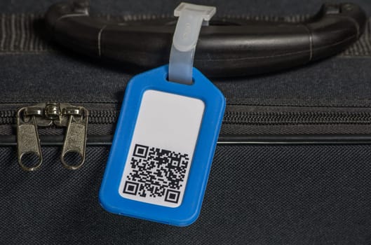 Suitcase with QR code on trailer