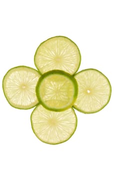 Five lime slices laid out as a pattern