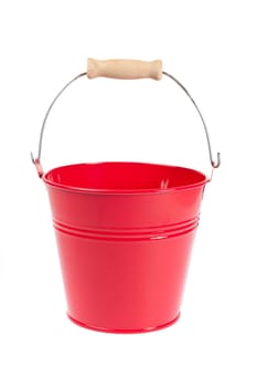 Red tin bucket against white background