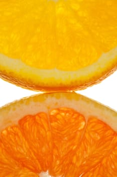 Macro shot of half an orange and blood orange