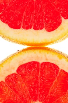 Macro shot of two half grapefruit slices