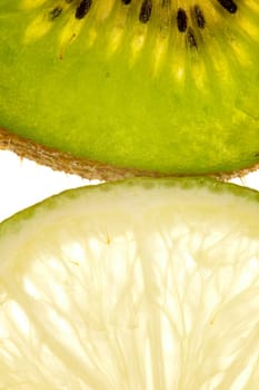 Macro shot of a kiwi and lime slice