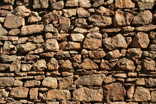 Wall built of stone and rubble without using any mortar