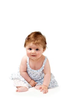 cute baby sitting and smiling