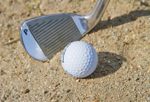 golf ball in a bunker