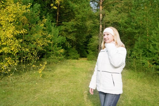 Young woman posing in the forest