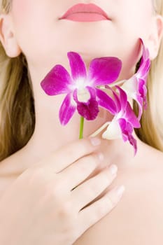 Woman neck and hand with flower