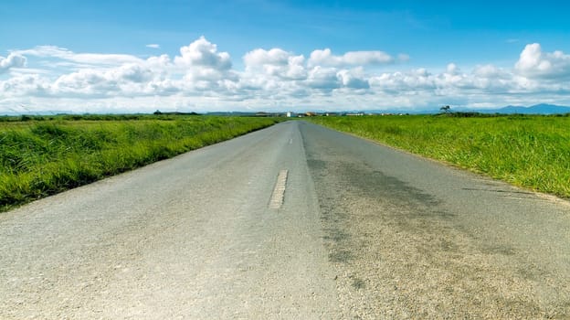 Open highway to the blue sky