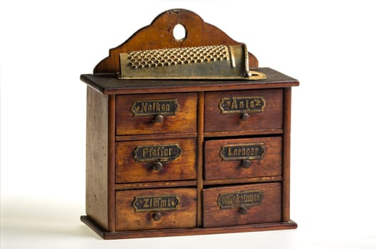 antique spice cabinet with six drawers