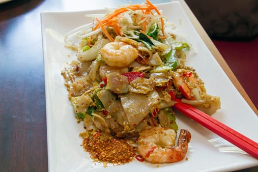 Thai Pad See Ewe Stir Fried Noodles with Sweet Soy Sauce  Prawns Vegetables and Spices