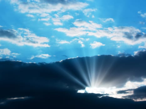 Sun shining through the clouds