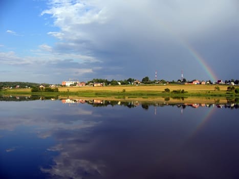 Reflection of a rainbow in water
