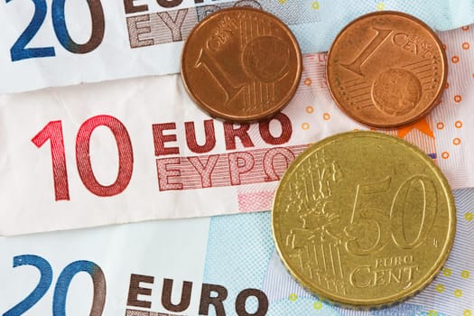 close up background of Euro banknotes and coins