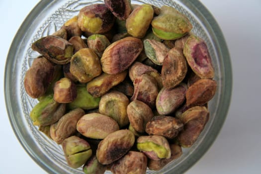 Healthful, edible, pale green seeds of evergreen tree pistacia vera