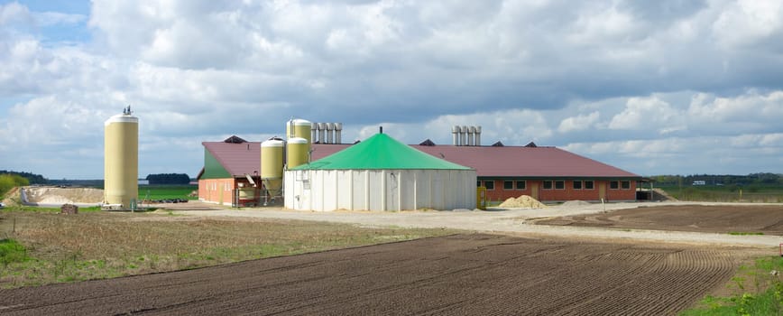 modern barn with several silos in germany
