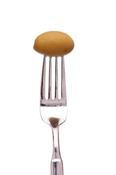 White isolated green olive on a fork