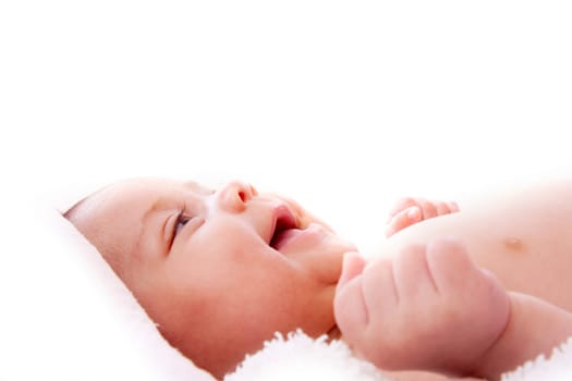baby wrapped in a towel