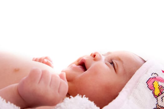 baby wrapped in a towel