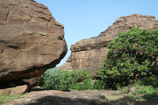 Two huge rocks with astonishingly matching face-fronts on northern hill at Badami, Karnataka, India, Asia