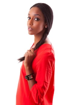 Portrait of a beautiful young black woman in red dress, isolated on white background