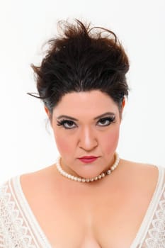Pretty plus size woman with white dress