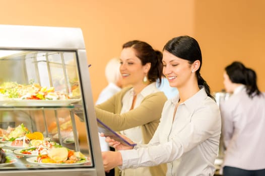 Cafeteria lunch young woman take salad plate fresh food canteen