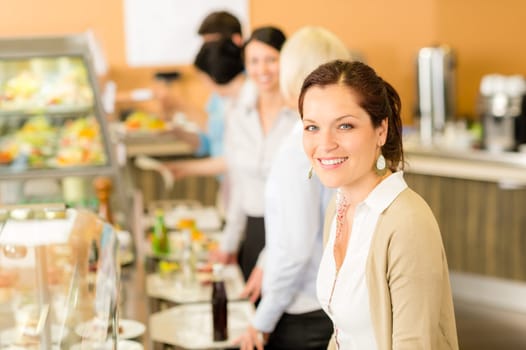 Business woman take cafeteria lunch smiling carry serving tray