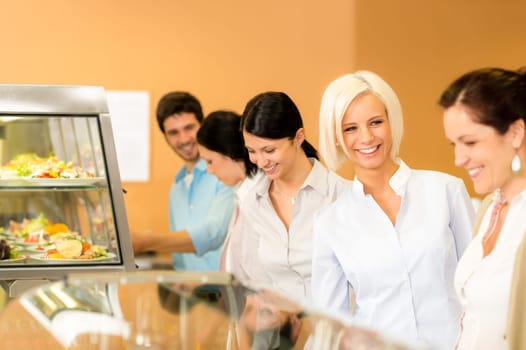 Business woman take cafeteria lunch smiling choose from self-service buffet