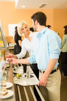 Office people at cafeteria chatting hold serving tray canteen self-service