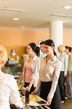 Cafeteria woman pay at cashier hold serving tray fresh food
