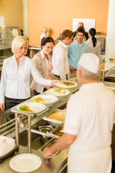 Business people take lunch meal in cafeteria display cabinet