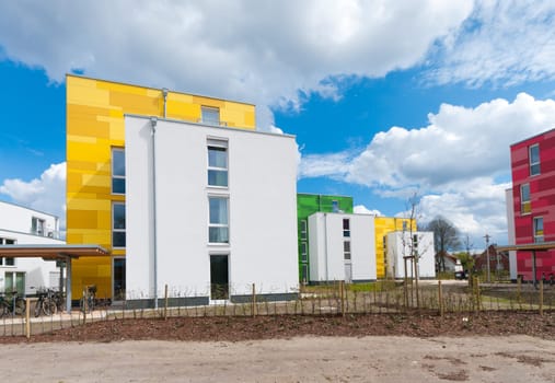 colorful new apartments under a nice cloudy sky