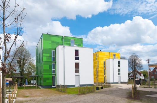 colorful new apartments under a nice cloudy sky