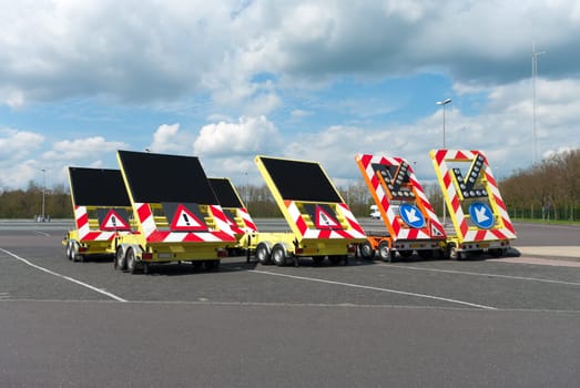 several traffic signs on trailers