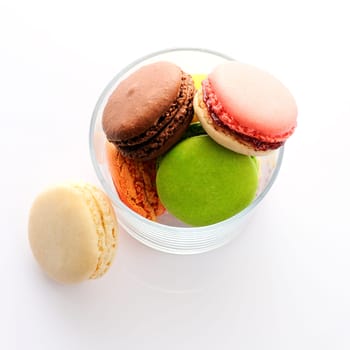 Colorful macaroons on white background