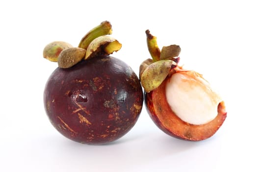Exotic fruit mangosteen on white background