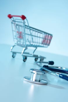 Are you shopaholic? You can not buy health concept. Stethoscope and shopping cart.