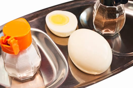 Egg boiled with salt and pepper