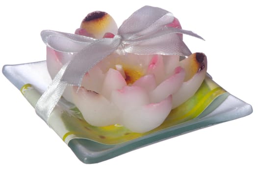 a scented candle on a white background