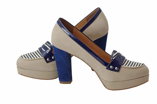 Elegant woman shoes on a white background