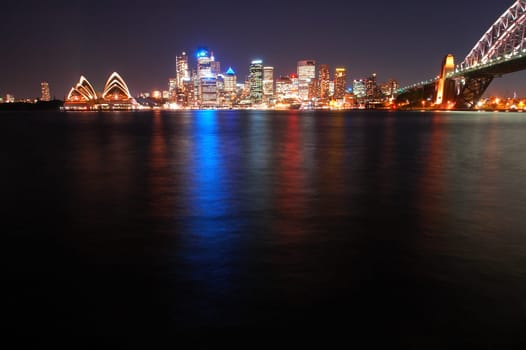 night sydney scene, reflection in water, more space left in the bottom for  eventual text message or something