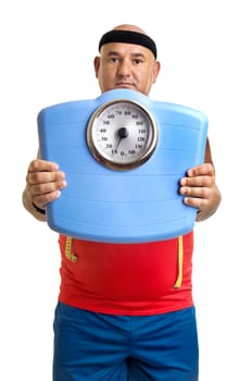 Large fitness man with weight scale isolated in white