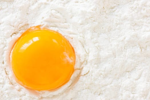 yellow egg yolk in the white flour