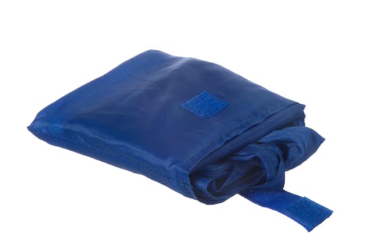shopping bag in blue fabric on white background