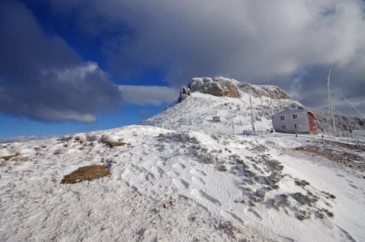Chalet in winter on mountain