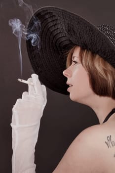 Lady with gloves and cigarette