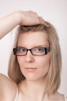 young woman with glasses