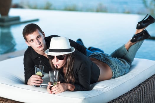 Young couple. Sea on the background