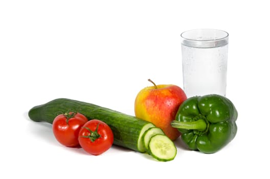 Fresh fruit and vegetables with a glass of mineral water