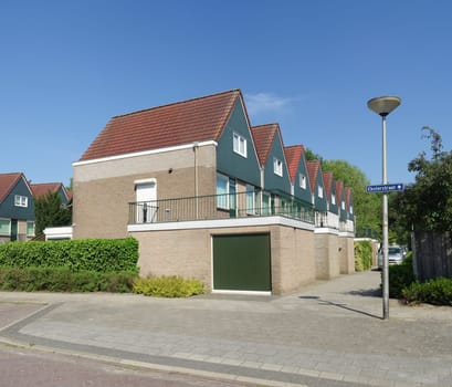 row of identical detached houses in Oldenzaal, Netherlands